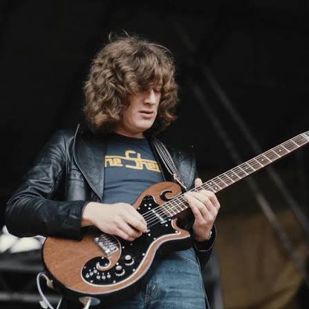Early photograph of guitarist Tim Renwick with a Gibson SG